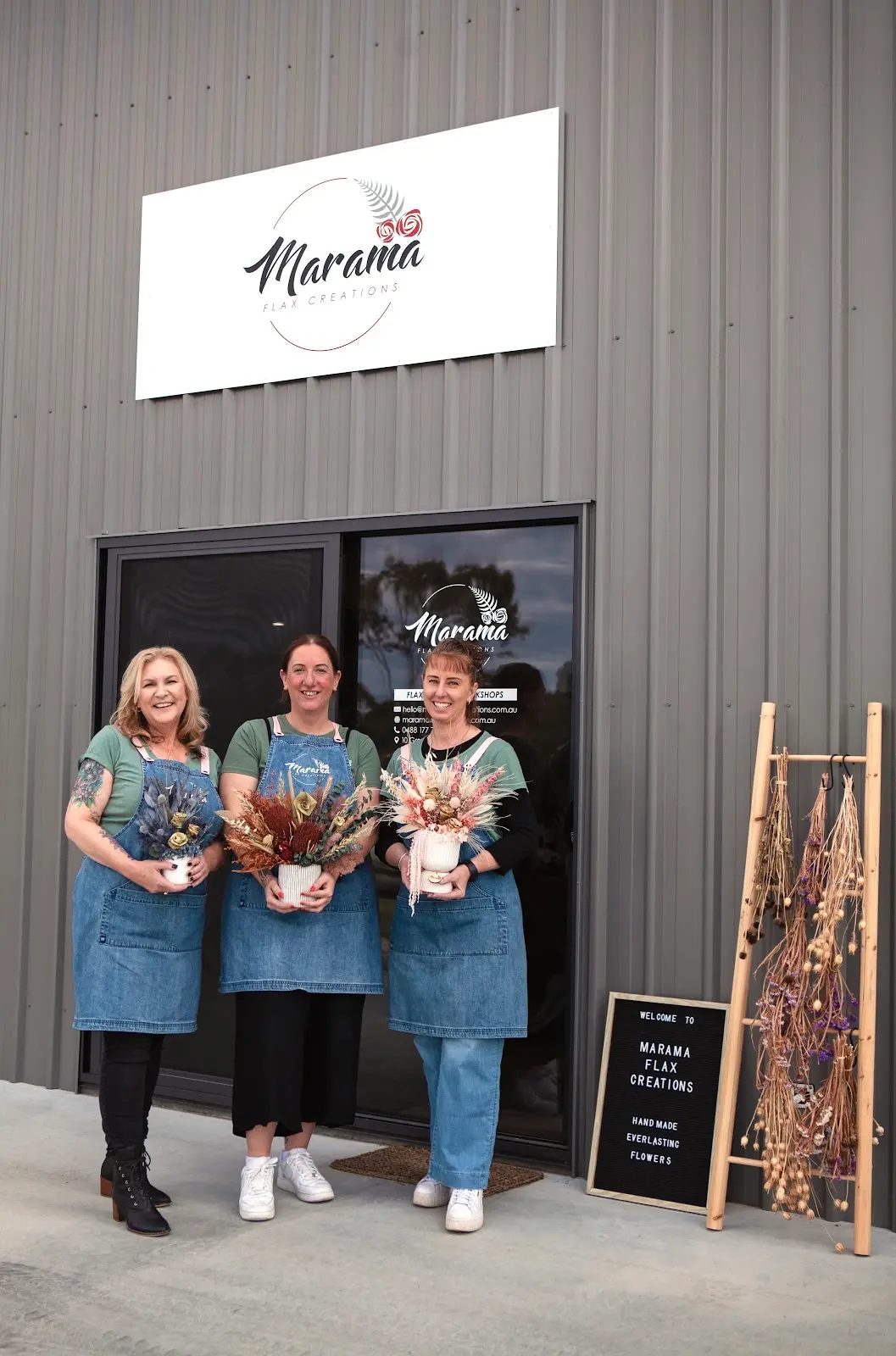 The Marama Flax Creations team outside the studio shopfront